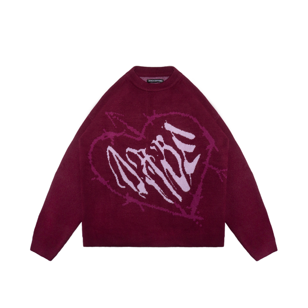 A wine red knit sweater with a knitted graphic on the front, featuring a drop shoulder fit and made with high-quality materials including viscose, nylon, and polyester. Unisex design perfect for casual or dressy occasions.