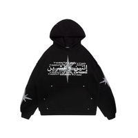 A black hoodie with unique rhinestone and screenprint design on the front, stars made of rhinestones on the sleeves and back, and a vintage, distressed finish. Made from a blend of cotton and polyester, with a peached interior for a cozy feel. Oversized unisex fit and extra big pocket make it practical for any occasion.