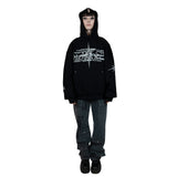 A black hoodie with unique rhinestone and screenprint design on the front, stars made of rhinestones on the sleeves and back, and a vintage, distressed finish. Made from a blend of cotton and polyester, with a peached interior for a cozy feel. Oversized unisex fit and extra big pocket make it practical for any occasion.