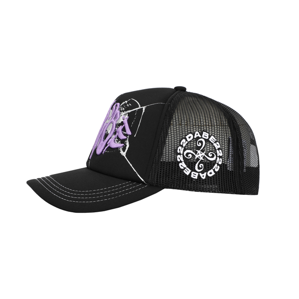 A black baseball cap with lilac broken glass design embroidered on the front and 22DABE22 logo on the side. The cap has a six-panel construction, adjustable strap at the back, pre-curved visor, and breathable eyelets. Perfect for completing a streetwear ensemble.