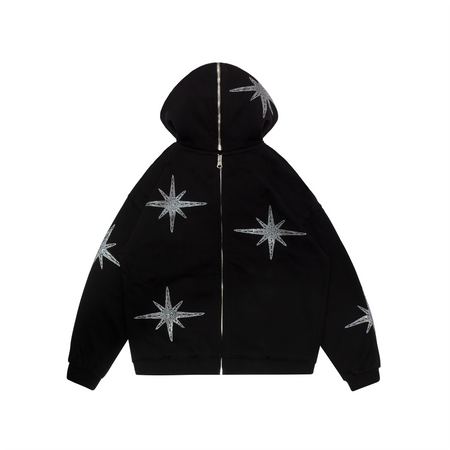 A black long sleeve hooded zip jacket with a unique split design featuring rhinestones and screenprint detailing at the front. The jacket has an oversized fit, big hood, and a distressed finish for a vintage feel. Made from 80% cotton and 20% polyester with a peached interior, it has a custom 22 puller and logo embroidery on the pocket.